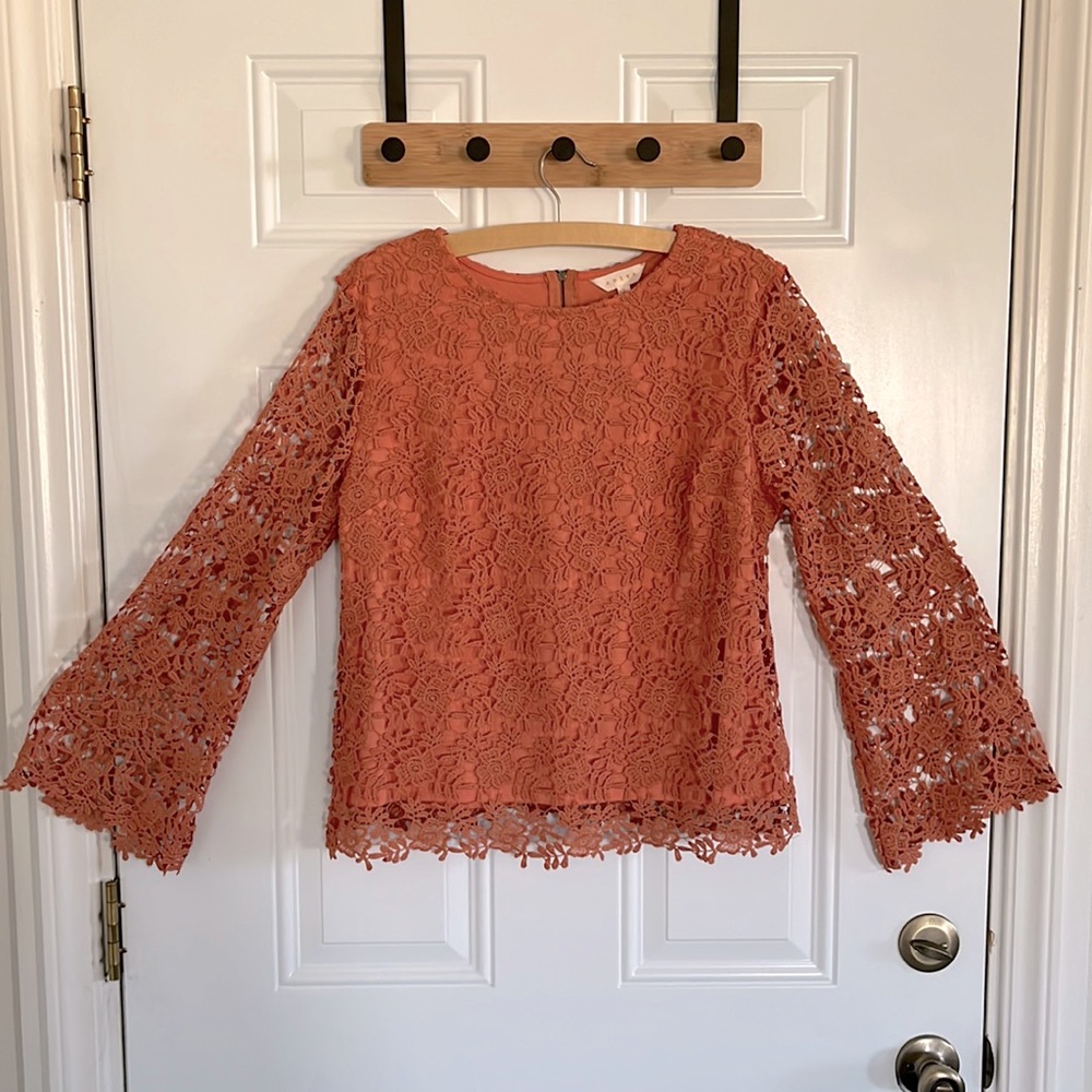 Adiva blouse with back zipper,flower design. Size Large